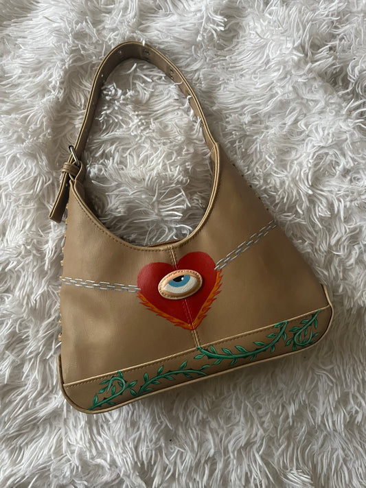 Eye Spy a Torturous Heart handbag